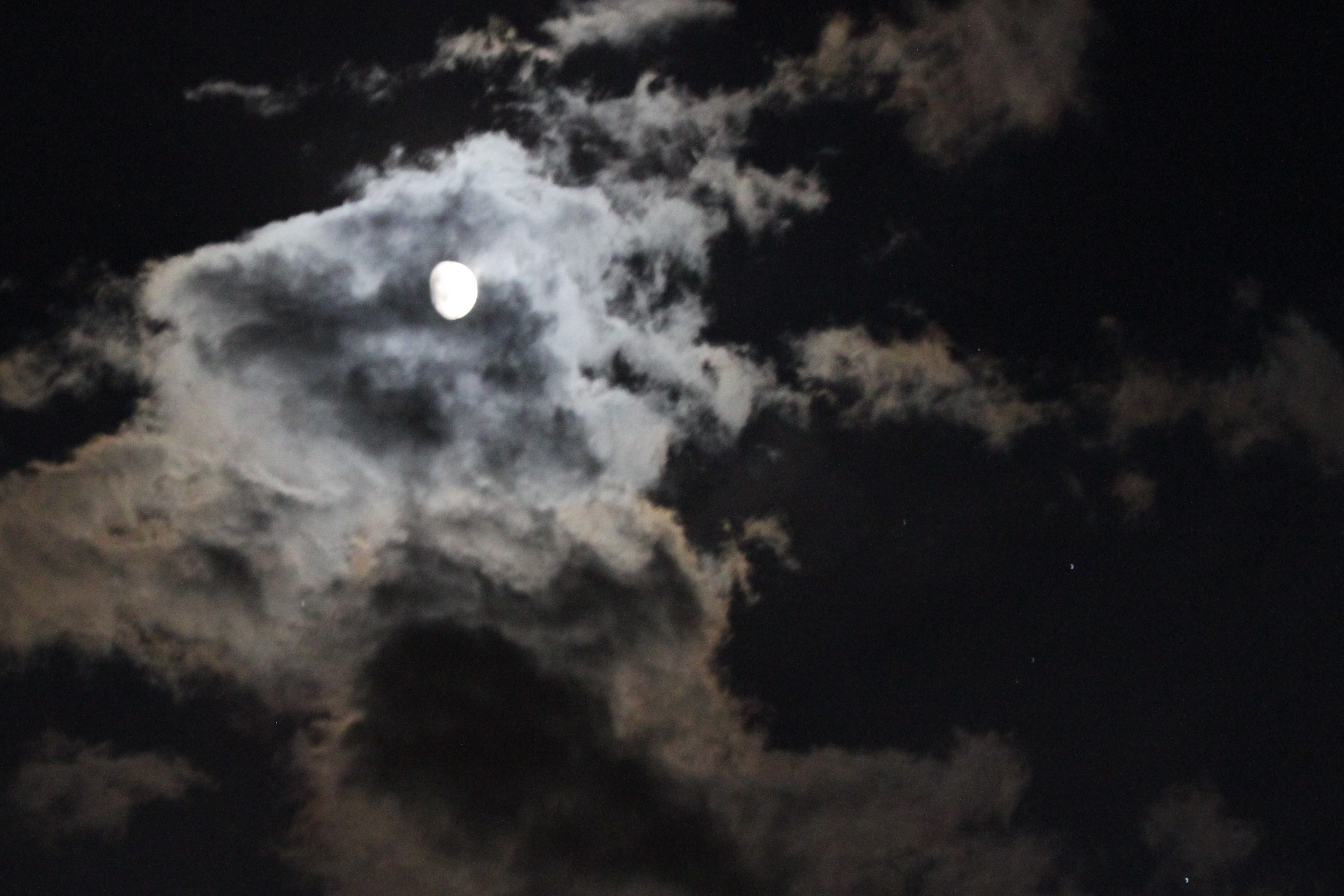 Moon through thin clouds